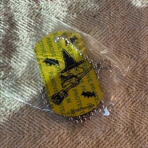 Peanuts Yellow Halloween Witch Dog Tag